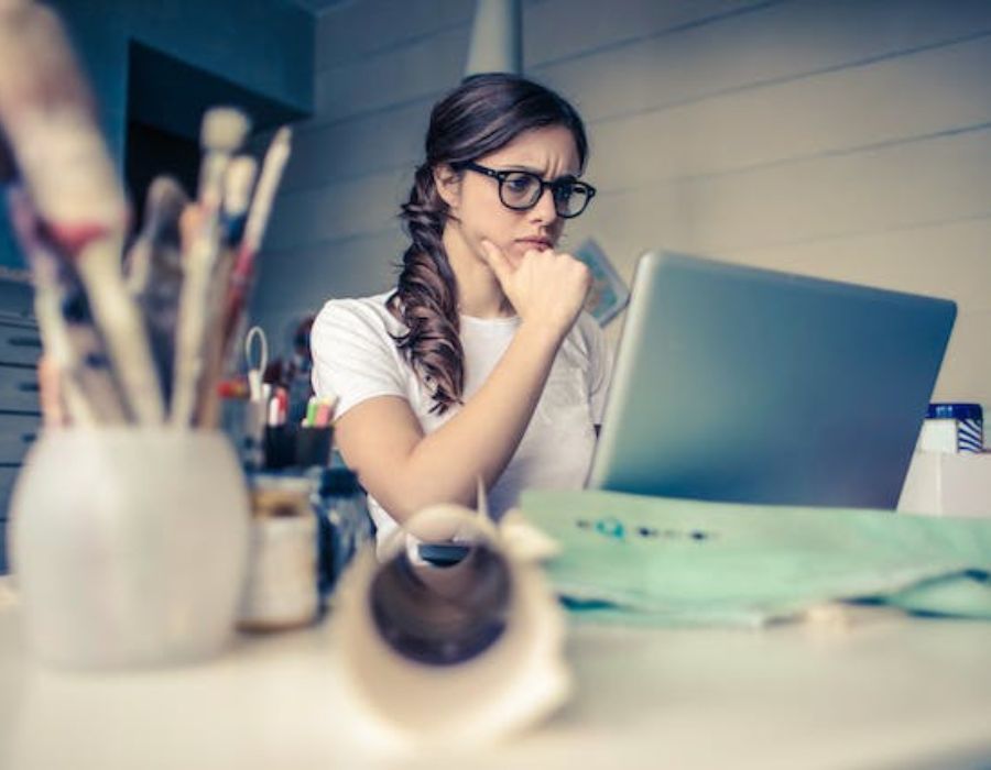 a woman going through Research and Technical Writing