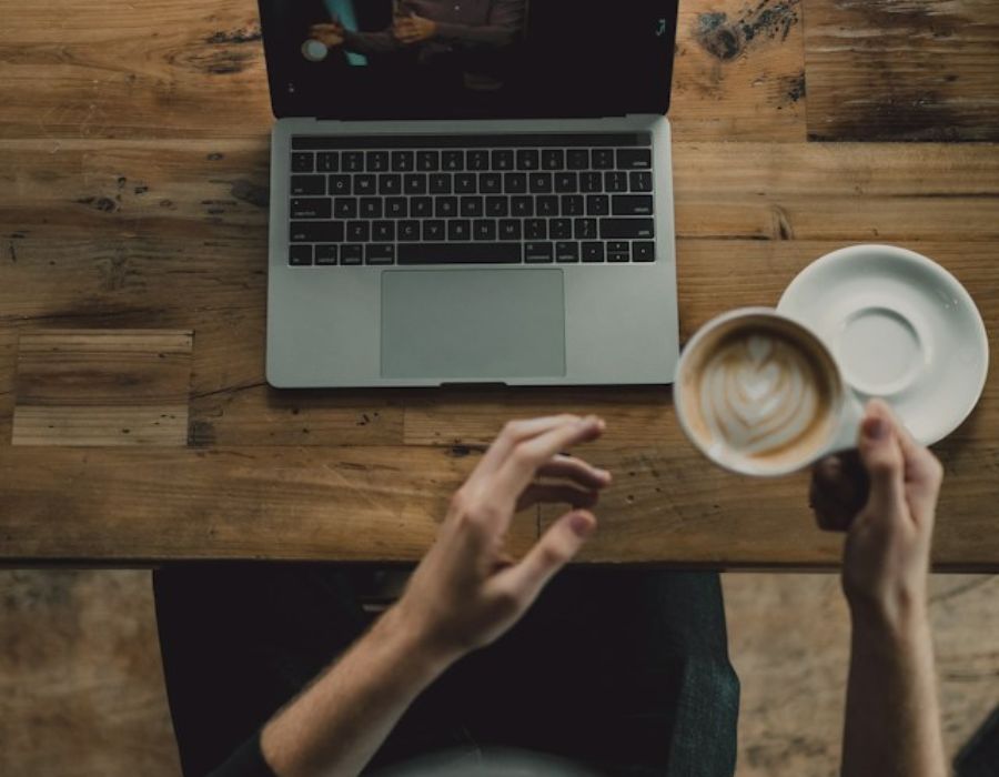 a woman doing research on how a virtual assistant optimizes your online presence