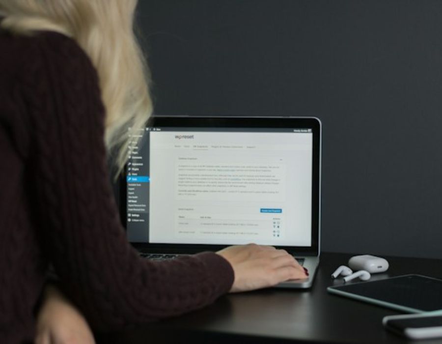 a woman optimizing the full potential of WordPress