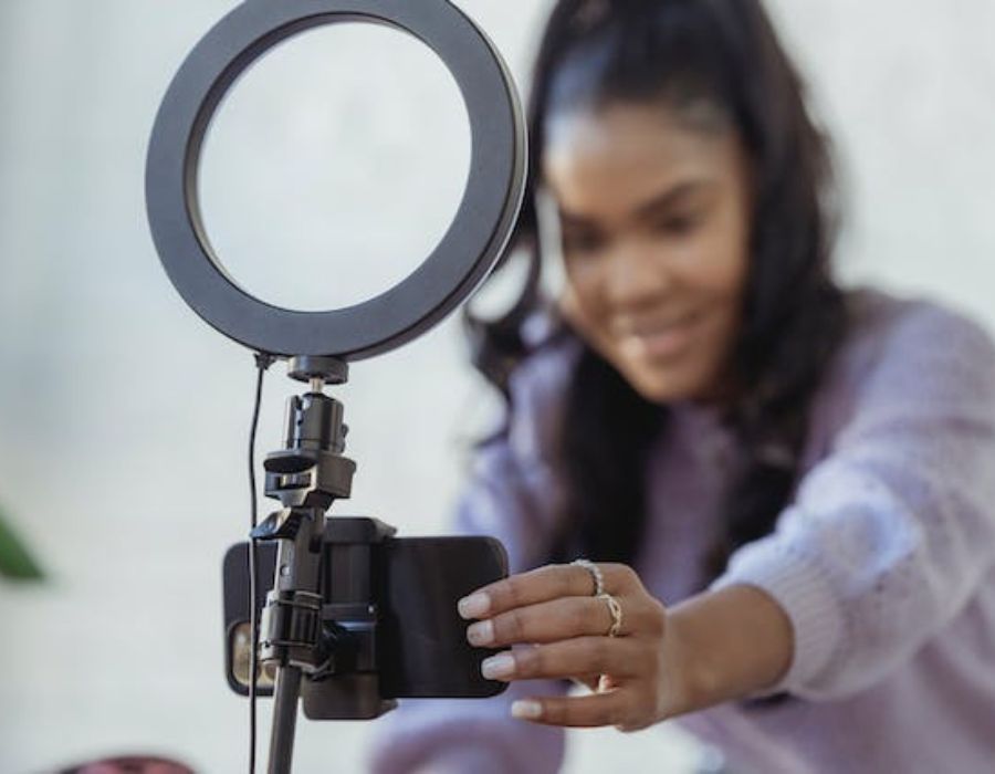 a woman shooting content