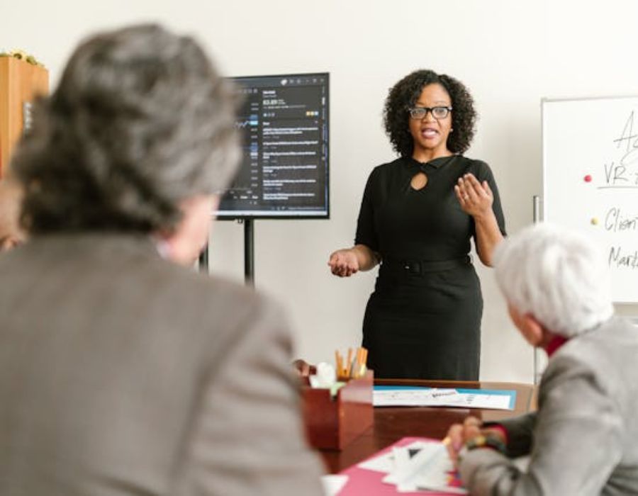a woman persuading the others on doing something