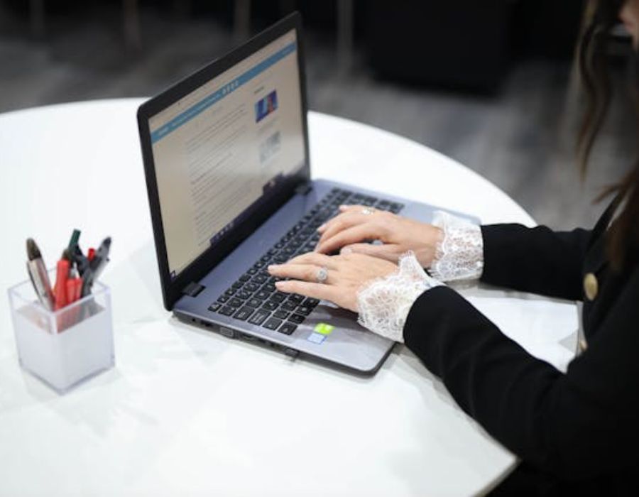 a woman using a laptop