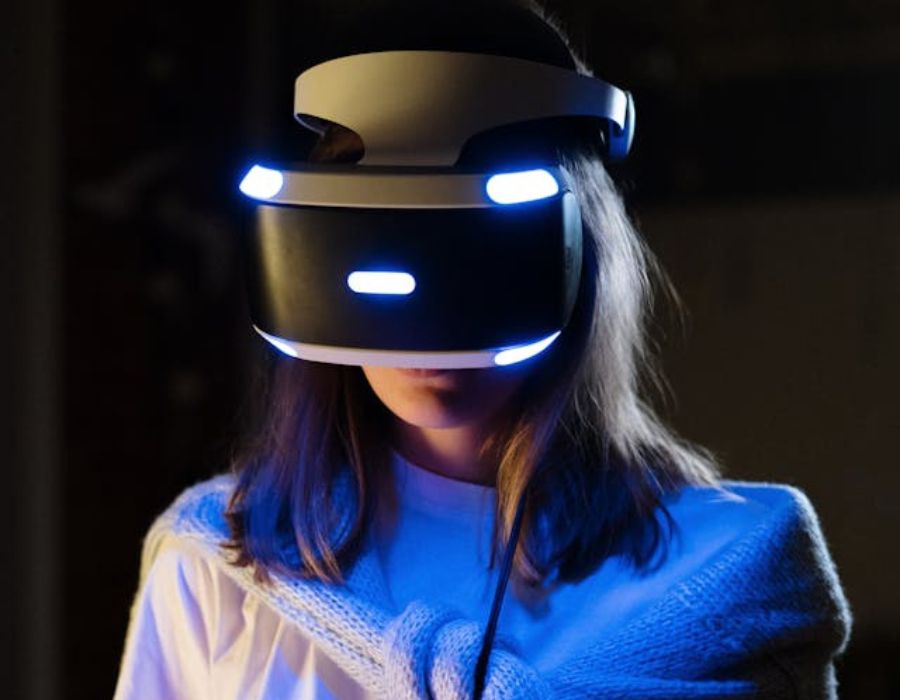 a woman using a virtual reality headset