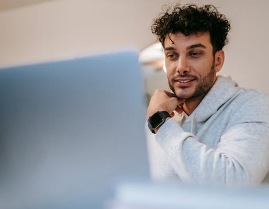 a man amazed at how content outsourcing is beneficial