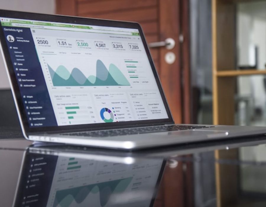 a laptop displaying a graph