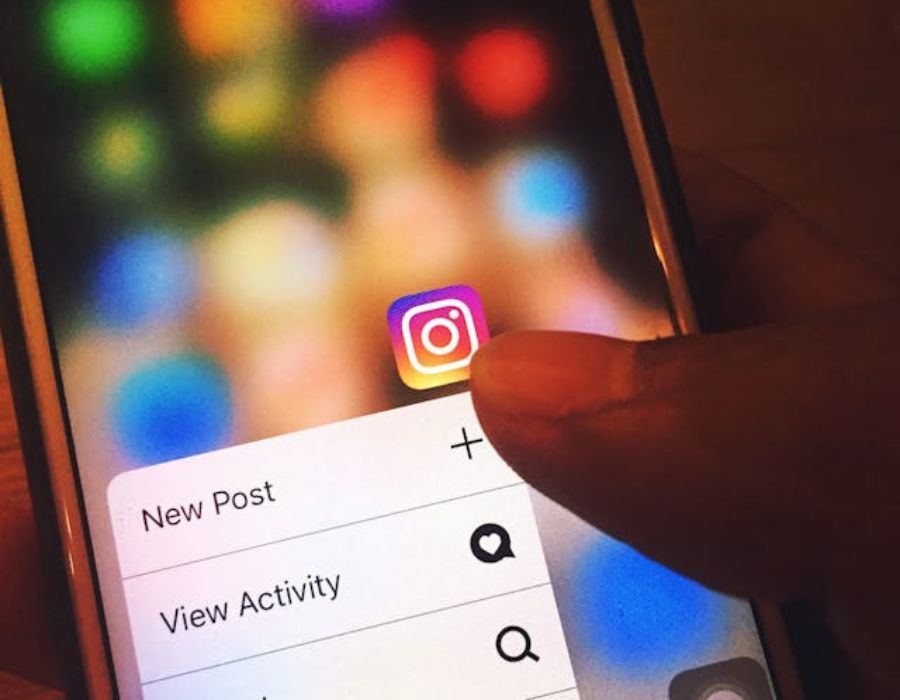 a person adding a new post on instagram